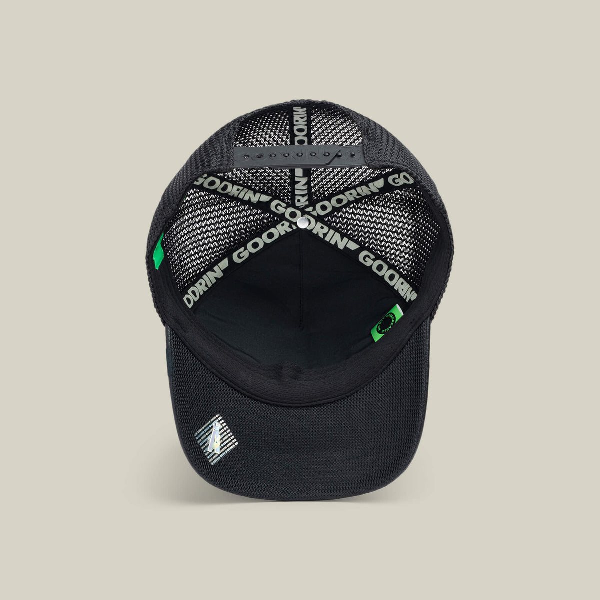 The NeoBrand GOAT by Goorin Bros. is a black mesh trucker hat with an interior sweatband featuring GOORIN branding and a snapback closure—an ideal match for your favorite monochrome sneakers.
