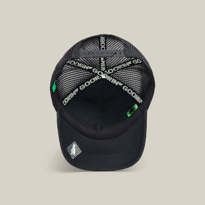 The NeoBrand GOAT by Goorin Bros. is a black mesh trucker hat with an interior sweatband featuring GOORIN branding and a snapback closure—an ideal match for your favorite monochrome sneakers.