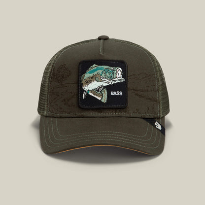 Palm green mesh baseball cap by Goorin Bros., called the Badlands Bass, featuring a landscape patch with a fish and the word "BASS" on the front, plus a small black side tag.