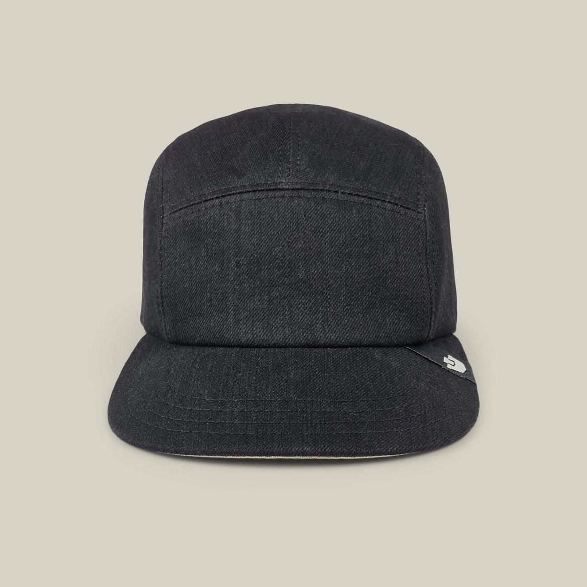 The East Lake 5-panel camp cap by Goorin Bros. in Black Denim, made from 100% cotton with a flat brim, is shown from the front against a plain beige background.