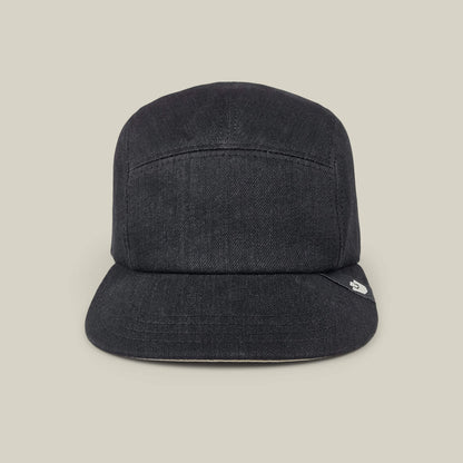 The East Lake 5-panel camp cap by Goorin Bros. in Black Denim, made from 100% cotton with a flat brim, is shown from the front against a plain beige background.