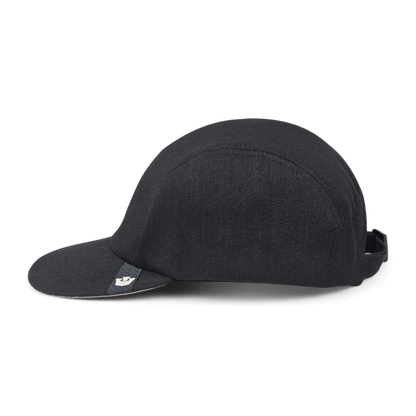 The Goorin Bros. East Lake cap is a low-profile black baseball hat with a short brim, made from 100% cotton and featuring a small logo tag on the front left, displayed against a plain white background.