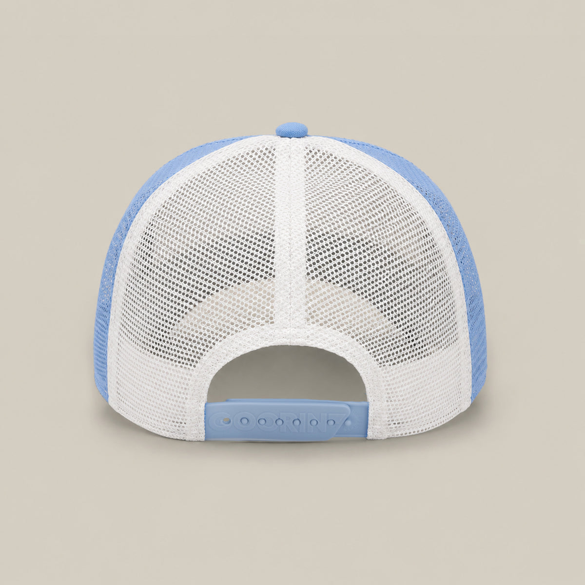 Back view of the Goorin Bros. La Pulga Atomica hat, a blue and white classic trucker with mesh panels, adjustable snap closure, and an embroidered GOAT patch.