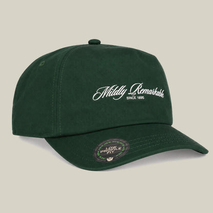 The Goorin Bros. Mildly Remarkable Script hat features dark green fabric, classic "SINCE 1995" embroidery on the front, and a Low Profile sticker—perfect for fans of a low pro fit.