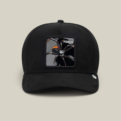 Experience blackout hat style infused with spider energy in the Goorin Bros. "Black Out Spider" trucker hat, featuring a Void colorway, a mesh back, and a rectangular collectible animal patch of a black widow spider labeled with the word POISON on the front. Photographed on a plain beige background.