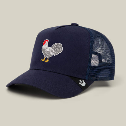 The Goorin Bros. Gone Cockmaxxing trucker hat features a navy blue design, mesh back, and a full front panel embroidered with a rooster.