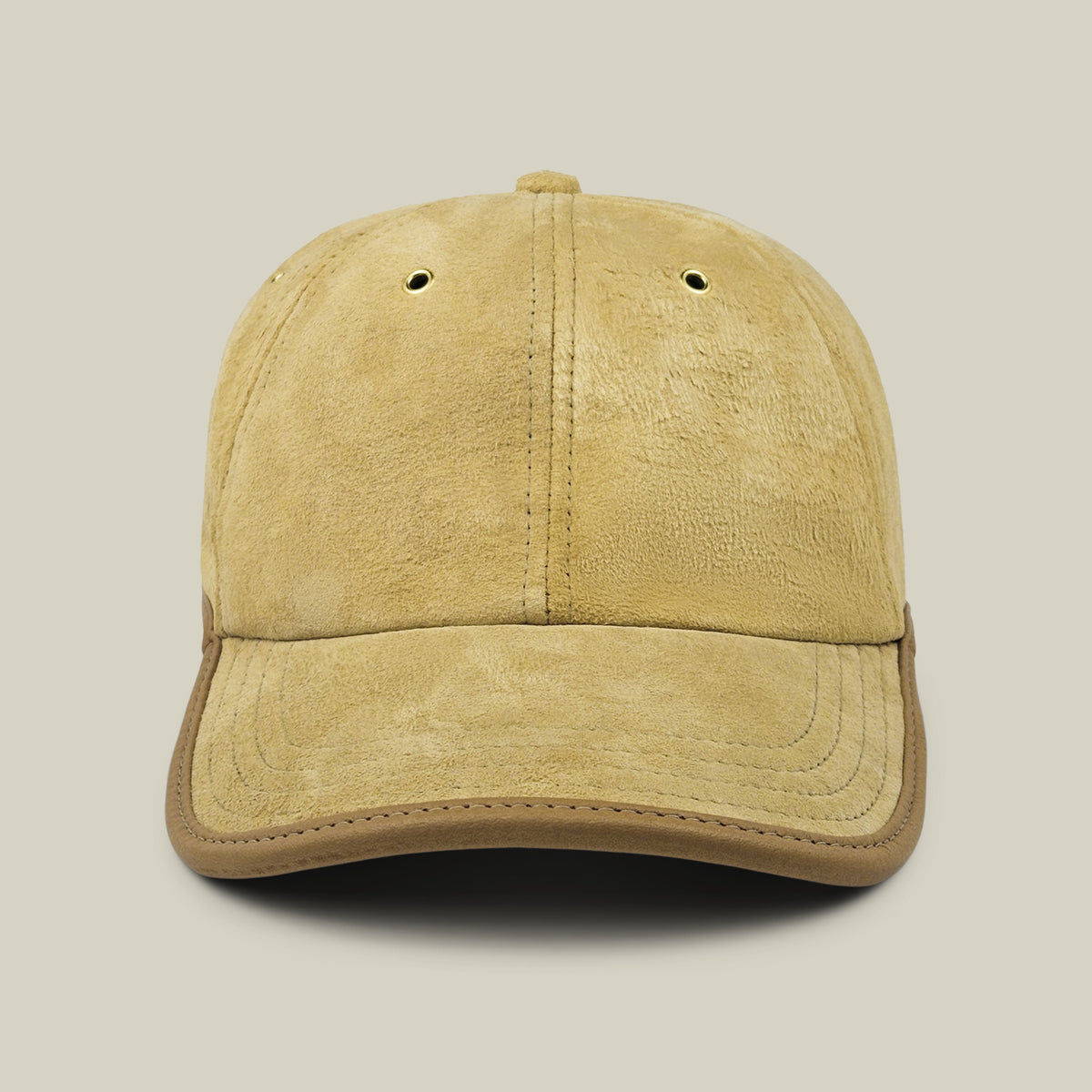 Front view of the Goorin Bros. Steiner cap in Khaki Tan, featuring a curved brim and two ventilation holes on the crown, set against a plain beige background.