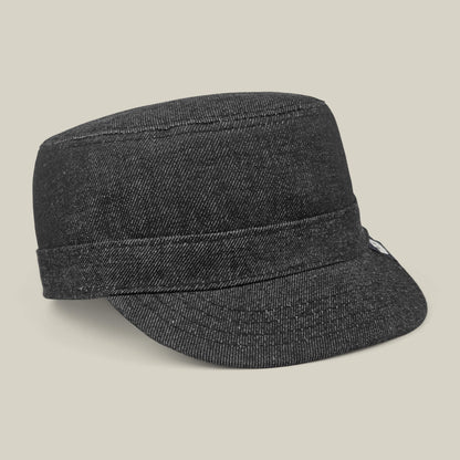 The Devonshire by Goorin Bros.—a black cotton cadet cap, hand sewn in the USA—is shown on a neutral background.