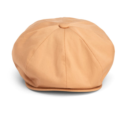 Chopping Block by Goorin Bros.—a tan newsboy cap with a button on top and a distinctive shape, shown from the front against a plain white background.