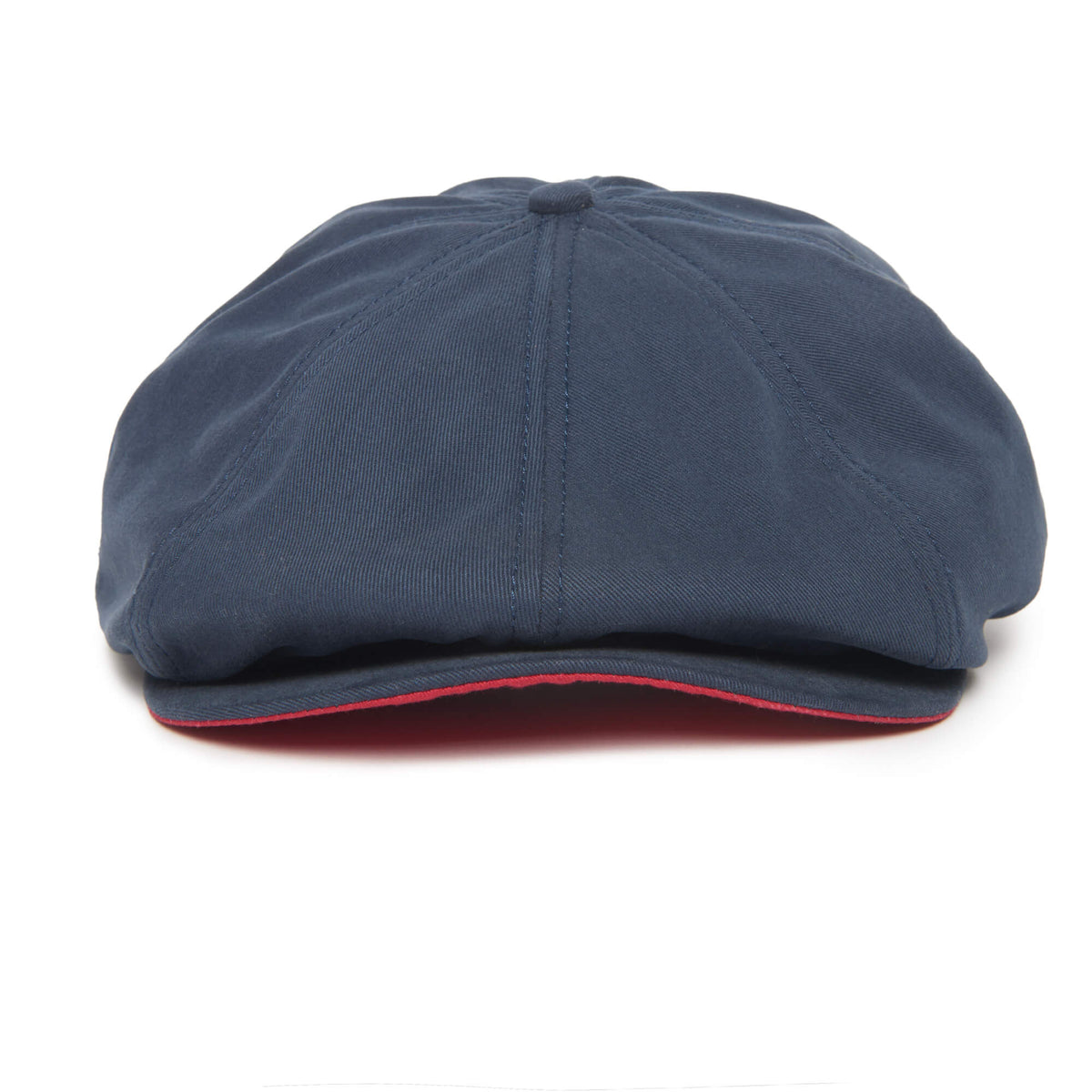 A navy blue Mulberry Street flatcap by Goorin Bros. features visible stitching, a slightly curved brim, and a thin red accent under the edge of the brim for a stylish touch.