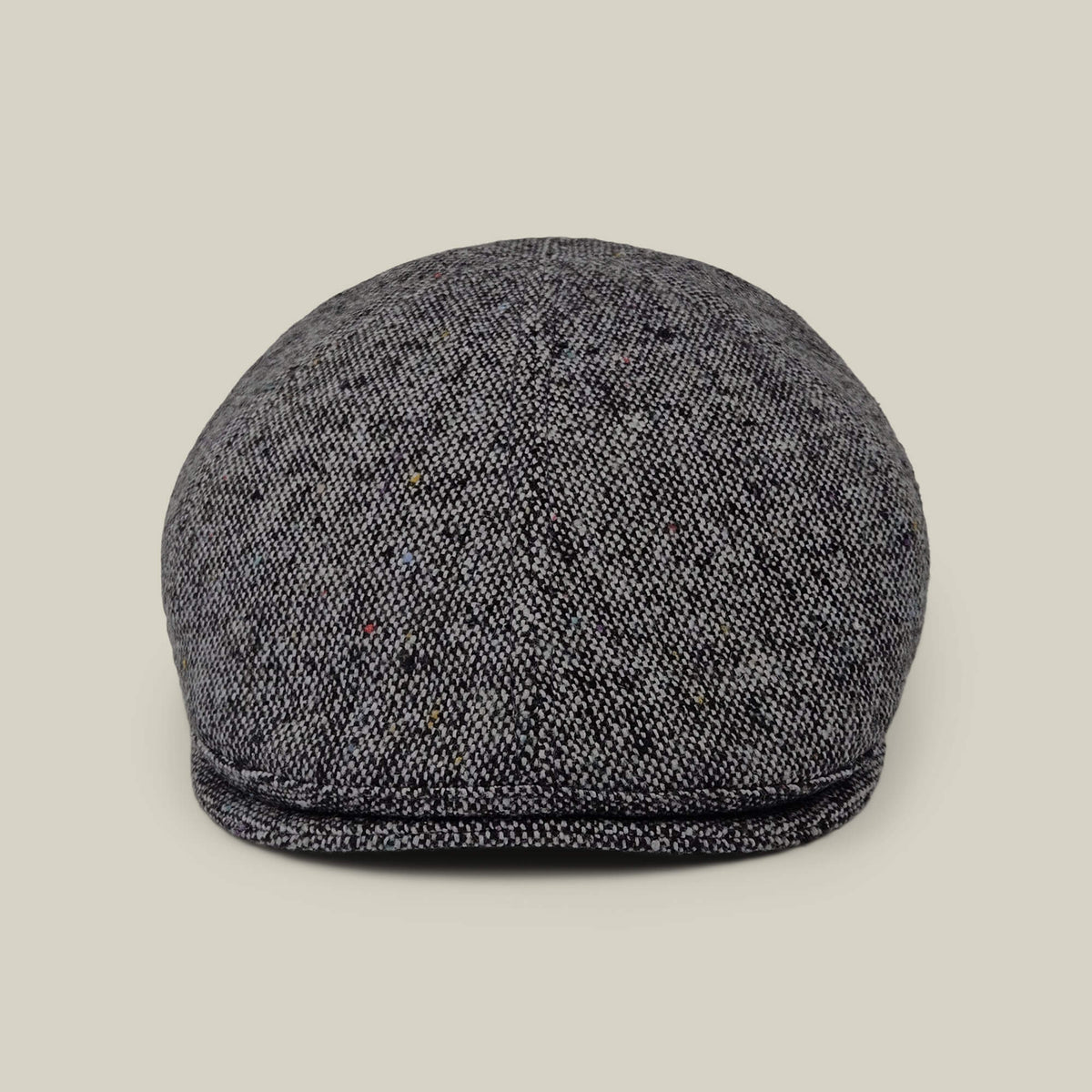 The Newlands flat cap by Goorin Bros. in Digital Gray, hand sewn in the USA, is photographed from the front against a plain beige background.