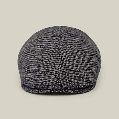 The Newlands flat cap by Goorin Bros. in Digital Gray, hand sewn in the USA, is photographed from the front against a plain beige background.