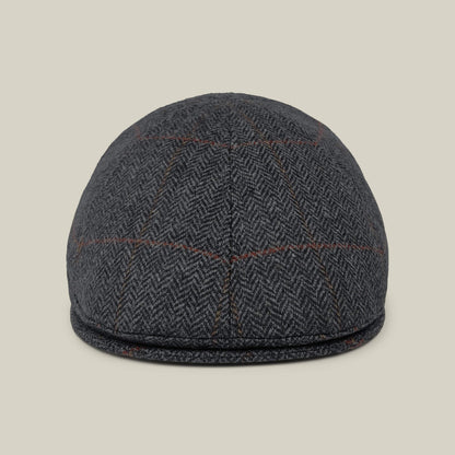 The Goorin Bros. Harry Bones flatcap in olive green, displayed from the front against a plain beige background.