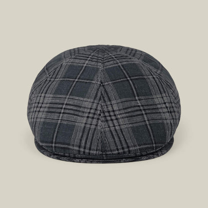 The Glenwood Grove by Goorin Bros. is a shade green plaid classic flatcap made from 100% cotton, shown front view against a plain beige background.