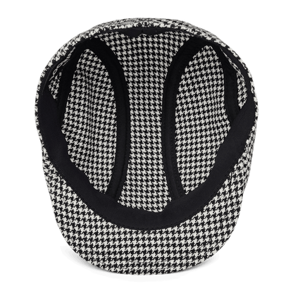 Top view of the Norwood cap by Goorin Bros., featuring a black and white houndstooth pattern in premium wool, with visible inner lining and seams; proudly made in the USA.