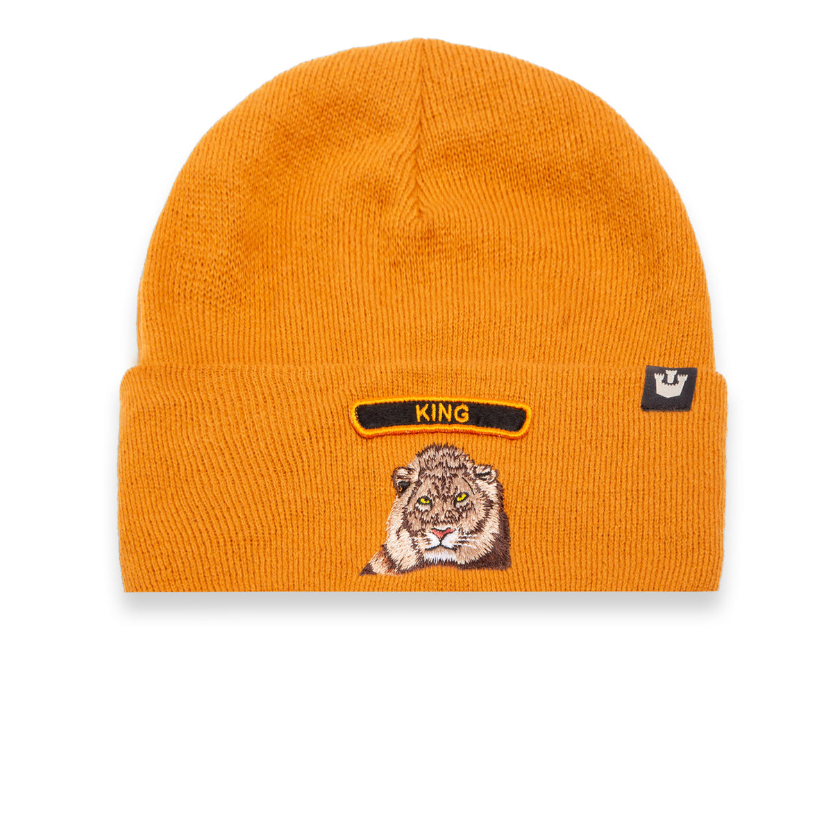 Stay warm in style with the Soft Rock King beanie from The Farm—an orange knit hat featuring an embroidered lion face, a yellow patch labeled “KING,” and a small black cuff patch with a white design—crafted for kings who want to rock their look.