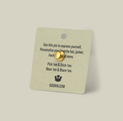 The Cash Cow Trucker Pin by Goorin Bros. is a gold zinc alloy pin on a card with personalization tips. Goorin trucker details and goorin.mom appear at the bottom.