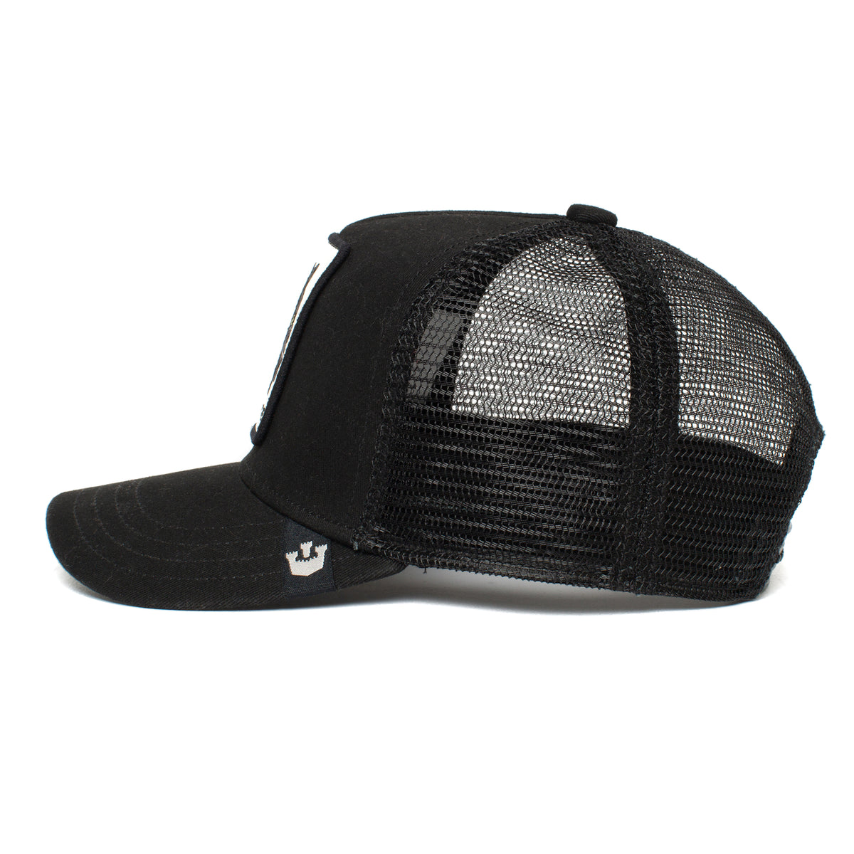 Side view of The Farm’s Little Panther trucker hat for kids, featuring a curved brim, structured front, mesh back for ventilation, and a bold black panther patch.