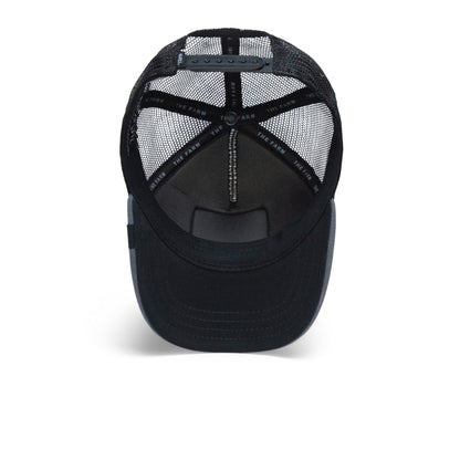 Black mesh trucker hat shown from the inside, featuring an adjustable snapback closure and a visible branded inner band reading The Farm. This kid-sized Fuzzy Trunk trucker is perfect for little ones, offering both comfort and style with its adjustable design.