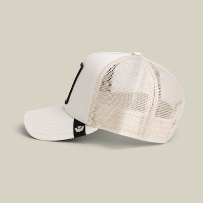 The Goorin Bros. Panther Trucker Mini is a white and cream mesh snapback cap with a black strap and small logo patch, shown in a studio product shot against a neutral background.