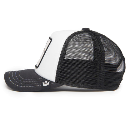 A side-view image of The Farm’s Tuxie, a black and white trucker hat featuring a curved black brim, a white front panel, and a mesh back. This adjustable hat comes in children’s sizes for the perfect fit.
