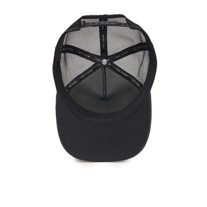 The Tuxie by The Farm is a black mesh trucker hat viewed from above, highlighting the interior with black hatbands and visible stitching; this adjustable hat ensures a comfortable fit and is ideal for those looking for a children’s sized option.
