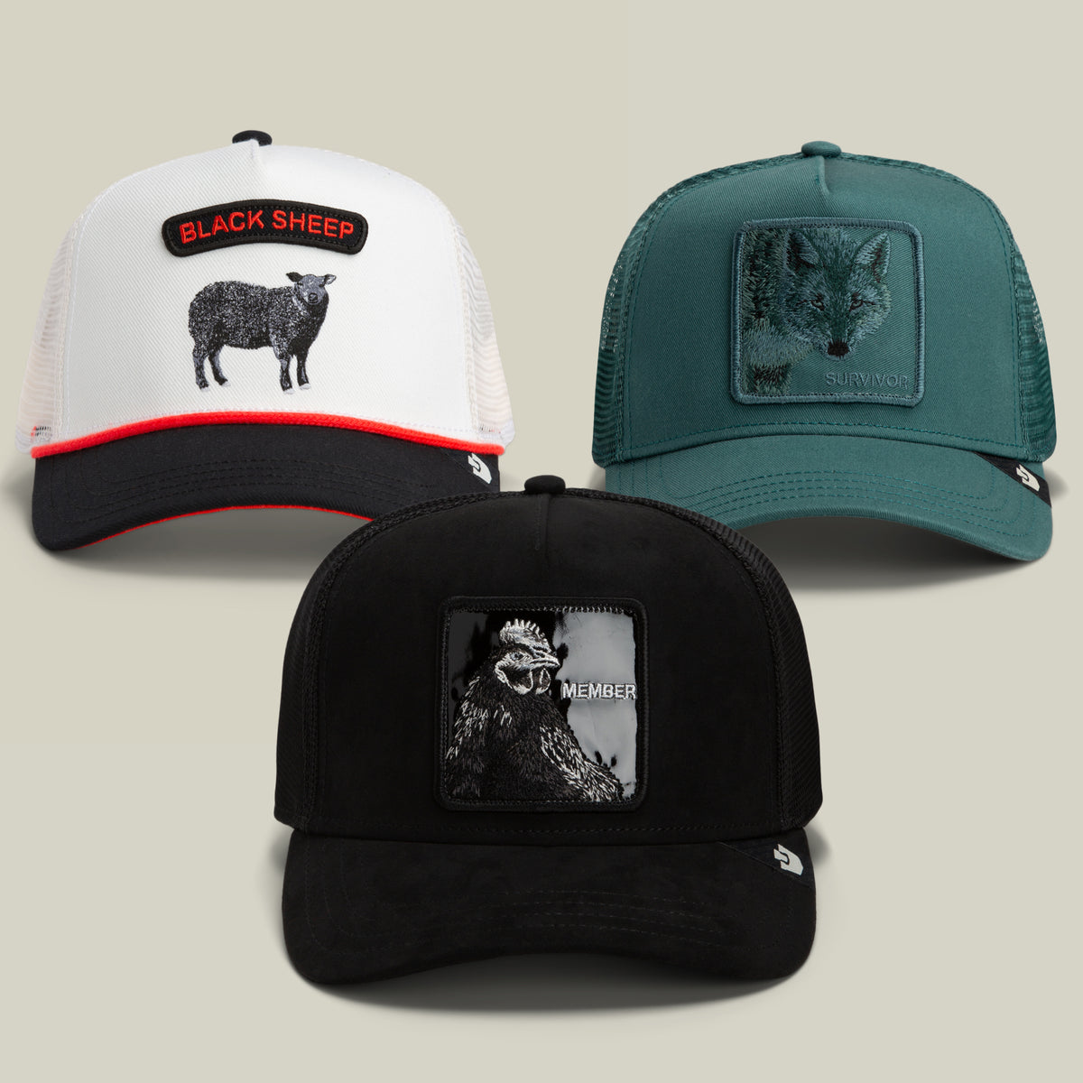 Experience the excitement of the Goorin Bros. Booster Pack Bundle, an animal-themed mystery collection featuring three hats: a white trucker with a black sheep patch, a green hat with a fox, and a black hat showcasing a gorilla and the word MEMBER.