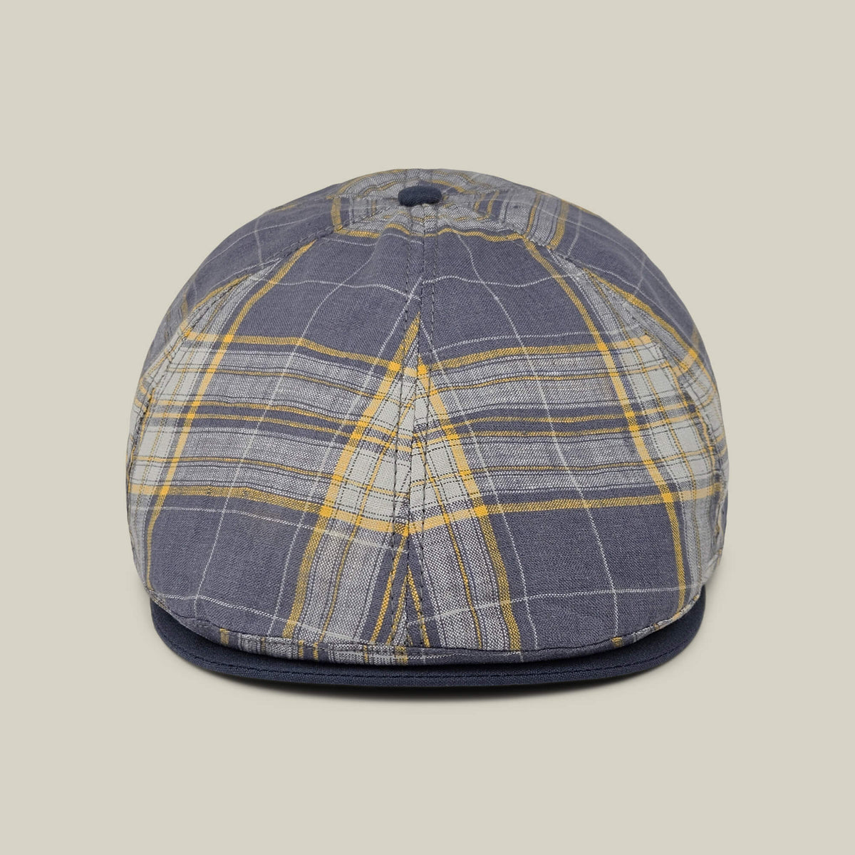 Front view of the Point Lobos 6 Panel Ivy flat cap by Goorin Bros., featuring a blue, gray, and yellow plaid pattern with a button on top, expertly handmade in the USA from a breathable cotton blend, shown against a neutral background.