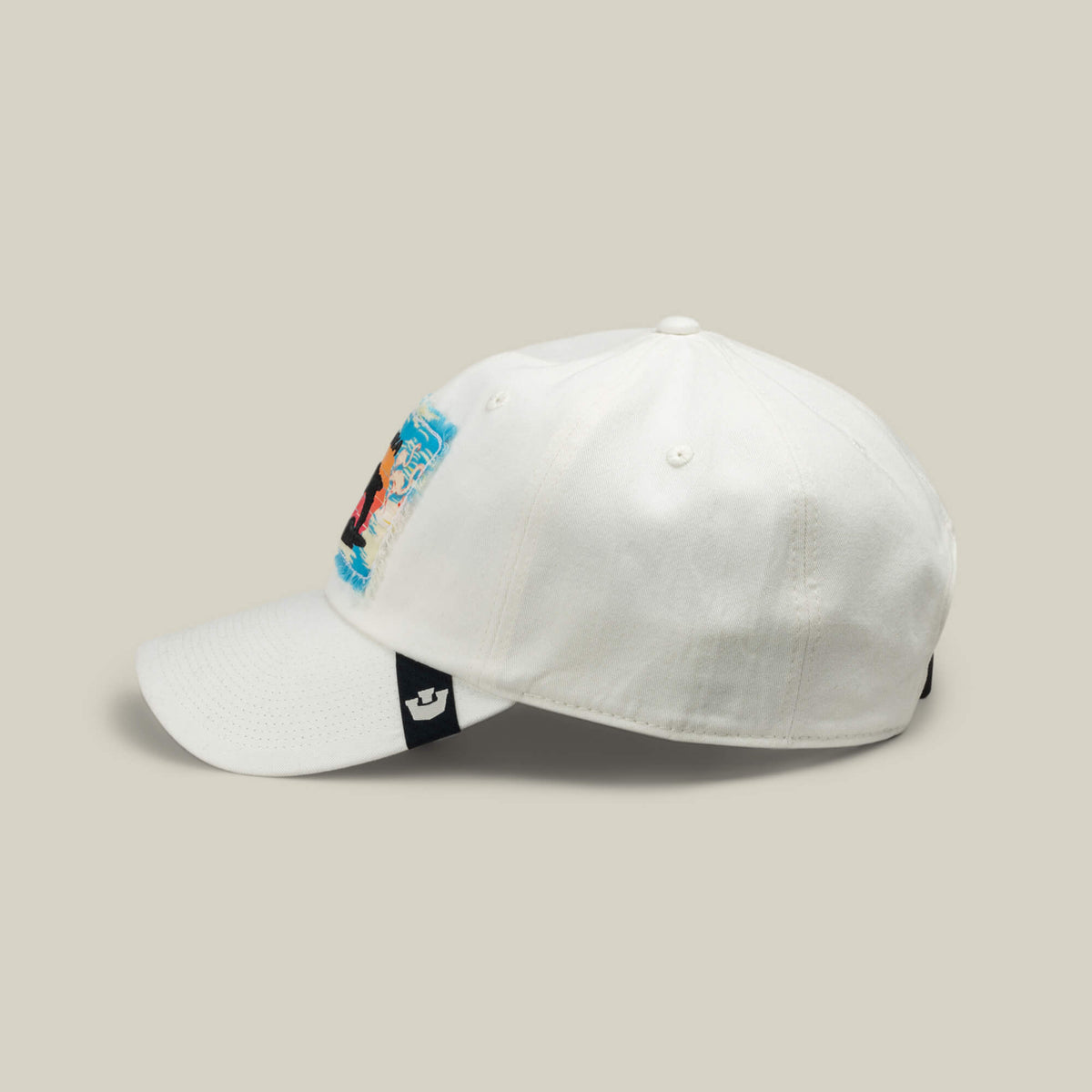 The OOO baseball cap by Goorin Bros. features a colorful distressed patch on the front left in the classic Papa Cap Fit, shown in side profile against a neutral background.