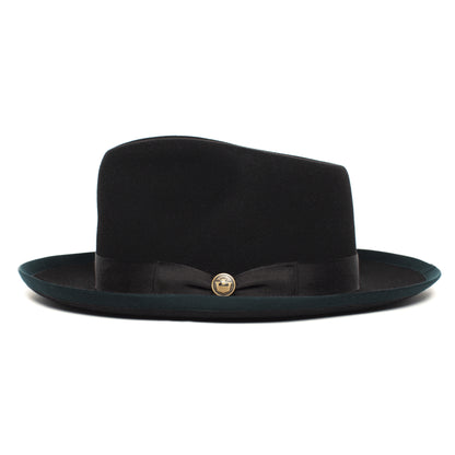 Introducing the River Gray by Goorin Bros.—a black felt wide brim fedora featuring a distinctive dark green brim, sleek black ribbon band, and an eye-catching gold button detail on the front. Expertly crafted in the USA, this hat is a testament to timeless elegance and sophistication.