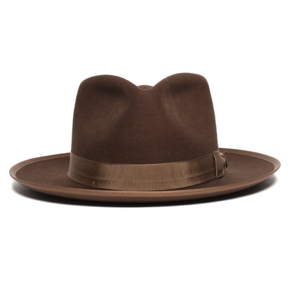 Goorin Bros. “River Gray” fedora in brown merino wool, featuring a wide brim and a matching ribbon band, displayed against a white background.
