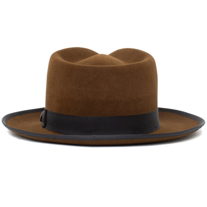 River Gray by Goorin Bros. is a brown merino wool fedora featuring a black band and a flat, wide brim, American made and photographed on a white background.