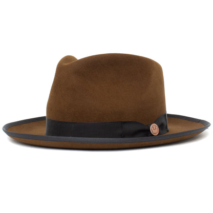 River Gray wide brim fedora hat by Goorin Bros., expertly crafted from premium merino wool and proudly American made, features a stylish gray felt design with a black ribbon band and a small round pin on the side, displayed against a plain white background.