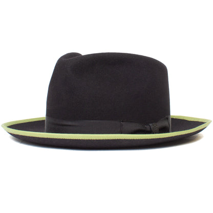 The River Gray by Goorin Bros. is a black merino wool fedora with a wide brim, accented by a light green edge and finished with a black ribbon around the base of the crown—an elegant American-made accessory perfect for any occasion.