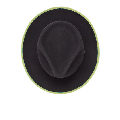 River Gray by Goorin Bros. is an American made merino wool fedora in black with a green trim, photographed from above against a white background, blending classic style with modern craftsmanship.