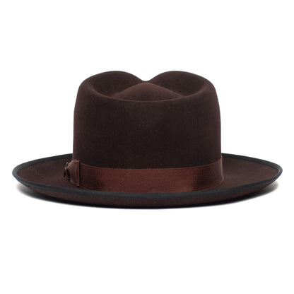 The Goorin Bros. River Gray is a wide brim merino wool felt fedora, featuring a matching brown ribbon band and American-made quality craftsmanship, shown here against a white background.