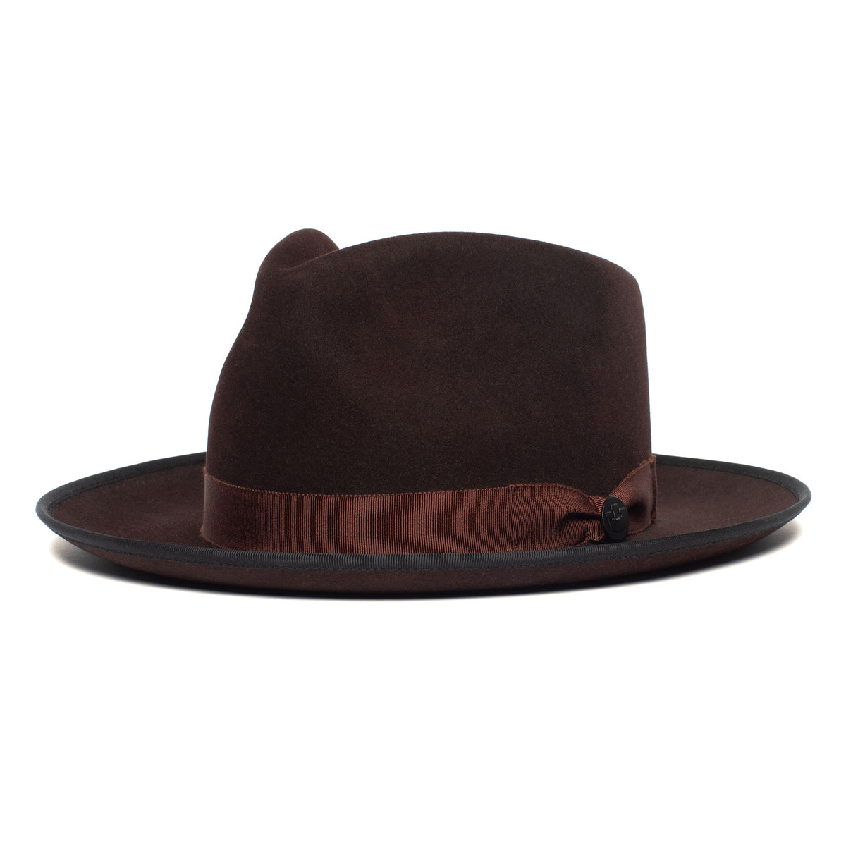 Introducing the Goorin Bros. River Gray: an American-made dark brown merino wool fedora featuring a wide brim with a black edge and a matching brown grosgrain ribbon band adorned with a small bow and button detail. Shown against a plain white background.