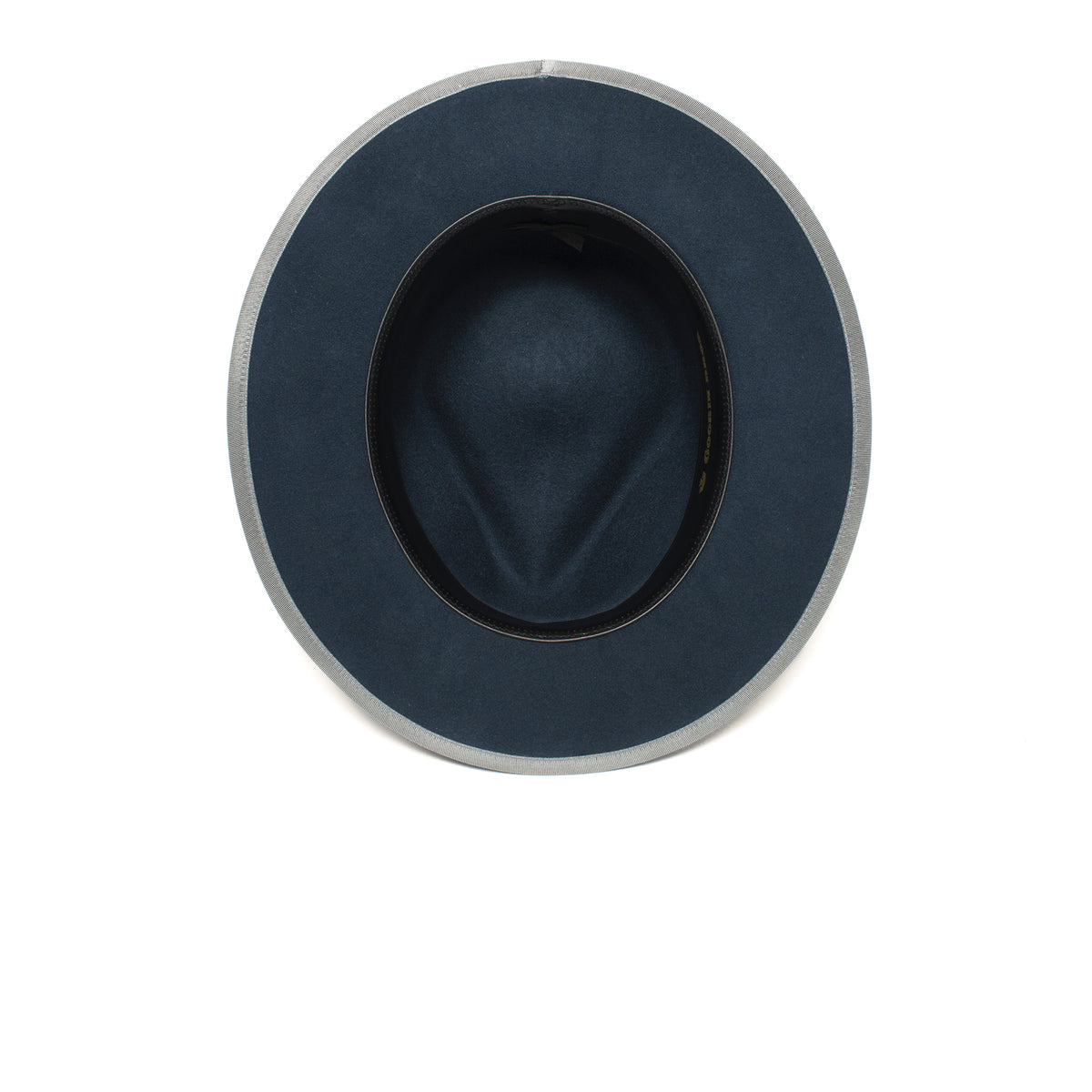 A wide brim “River Gray” fedora by Goorin Bros., American made in dark blue with a light grey edge, shown from above on a white background.