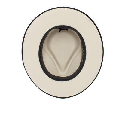 Top-down view of the Goorin Bros. River Gray, an American-made off-white wide brim fedora featuring a black inner band and a visible crease in the crown, photographed on a white background.
