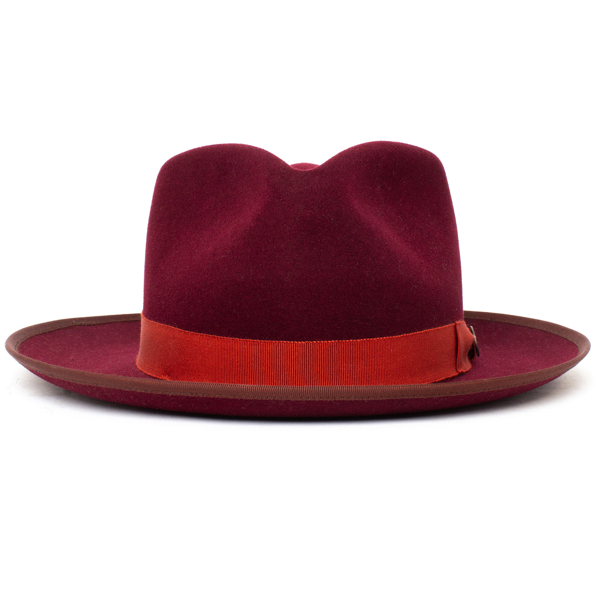 A wide brim fedora, the River Gray by Goorin Bros., is American made from premium merino wool, featuring a striking red grosgrain ribbon band and elegantly displayed against a white background.