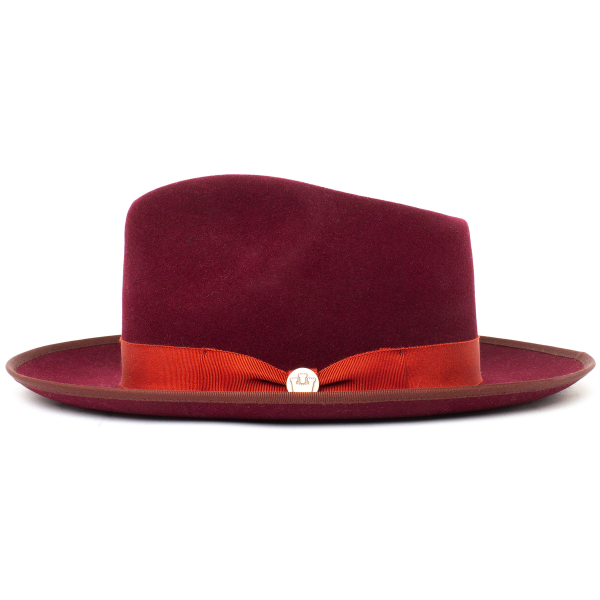 The Goorin Bros. “River Gray” is a burgundy merino wool fedora featuring a red-orange ribbon band and a small metallic emblem on the front, shown against a white background.